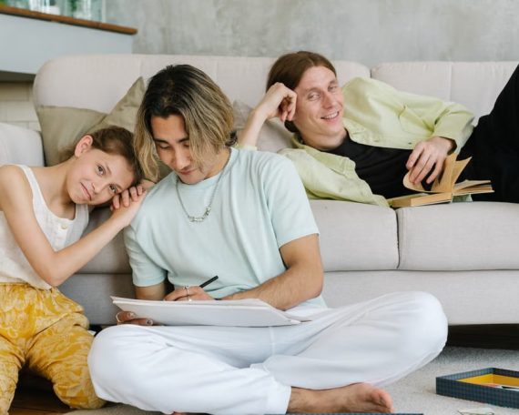 A family enjoying quality time in a comfortable living room setting.